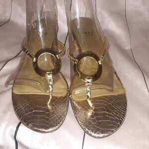 IMPO WOMANS SANDALS SIZE 9.5 in a beautiful "GOLD" COLOR